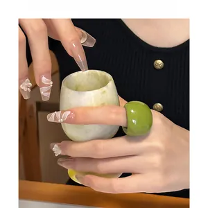 Minimalist green resin statement ring for women featuring a bold chunky glossy design