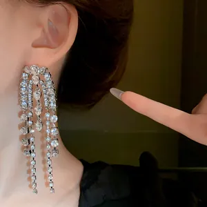Elegant silver needle long tassel drop earrings with sparkling rhinestones for women.