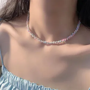 Close-up view of a pastel colorful seed bead woven necklace worn as a sweet ins style choker