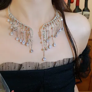 Close-up detail of an elegant silver-tone rhinestone water drop fringe choker necklace