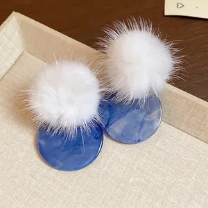 Stylish fur pom-pom and blue resin circular stud earrings for autumn and winter