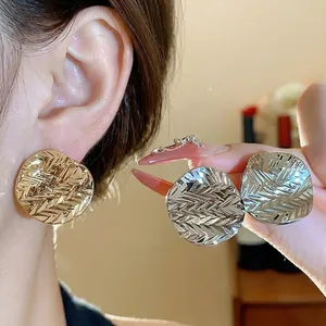 Elegant 18k gold plated wrinkled round stud earrings with unique textured finish for women