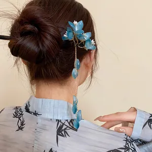 Close-up detail of a blue flower tassel hair pin showcasing elegant New Chinese style