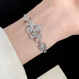 Detailed view of an elegant silver rose bracelet featuring intricate zircon stonework