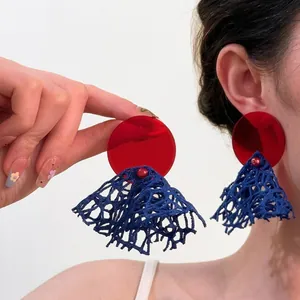 Vintage oversized red and blue mesh drop earrings perfect for summer beach travel outfits