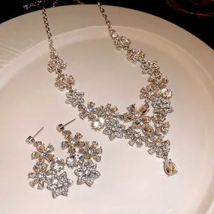 Vintage hollow flower necklace and earring jewelry set with brilliant rhinestones