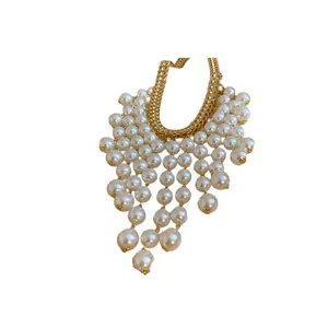 Elegant French style pearl tassel necklace with gold chain for a luxury fashion look