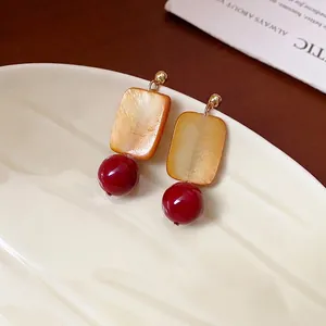 Elegant vintage S925 silver needle drop earrings with square resin and red glass beads