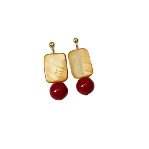 Retro Chinese style stud earrings with rectangular pearlescent and red glass beads