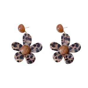 Vintage leopard print resin flower stud earrings featuring unique brown marble accents