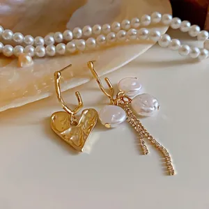Elegant asymmetric heart and baroque pearl tassel drop earrings with vintage gold hammered finish