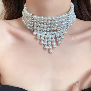 Elegant five-layer faux pearl tassel choker necklace with sparkling rhinestone accents for women