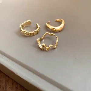Chic set of three irregular geometric open rings with a premium gold finish for women
