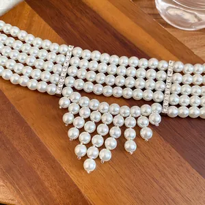 Close-up of a vintage French-style five-layer pearl fringe necklace with elegant rhinestones.
