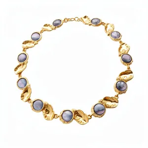 Elegant vintage palace style gold-tone necklace with purple resin stone cabochons