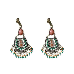 Bohemian ethnic retro teardrop earrings featuring oil drip design and colorful beaded tassels