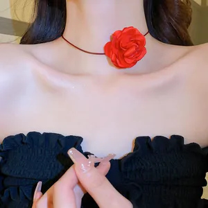 Elegant romantic red fabric rose flower choker necklace shown on model neck variant