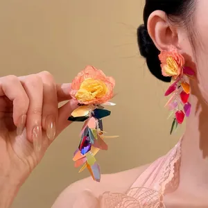 Bohemian handmade raffia flower earrings with colorful iridescent dangles for summer