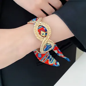 Exotic French style alloy bangle featuring a vibrant colorful printed silk scarf ribbon