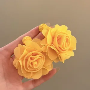 Sweet yellow chiffon flower earrings with raffia base for bohemian beach vacation style