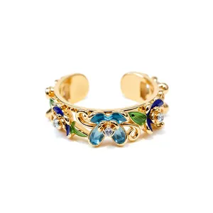 Elegant 18k gold plated open ring featuring vintage enamel flowers and clear crystals