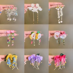 Set of nine diverse floral and pearl tassel dangle earrings with s925 silver needles