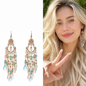 Bohemian beaded tassel earrings with colorful crystal drops worn by an Asian model