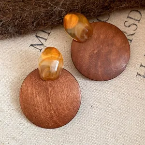 Vintage Maillard style round wood stud earrings with amber resin accents and silver needles