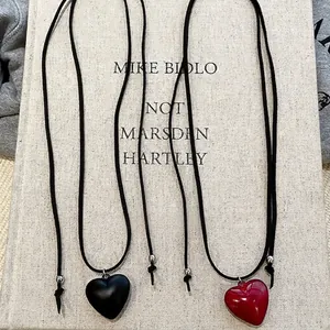 Elegant set of black and red resin heart pendant necklaces with adjustable cord straps