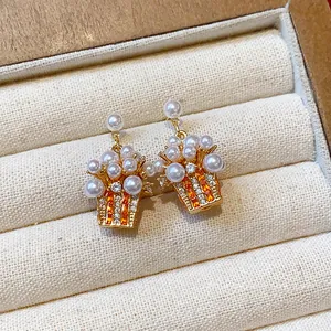 Elegant 18K gold plated popcorn bucket earrings with white pearls and sparkling zircons