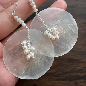 Elegant pearl tassel drop earrings with large translucent circular shell discs