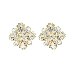 Elegant flower crystal stud earrings with sparkling teardrop stones and gold finish