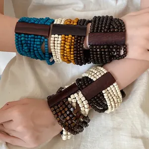 Bracciali di perle di legno multistrato bohémien in stile etnico vintage per donna