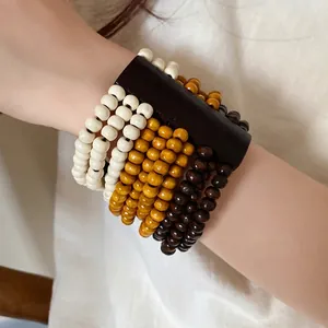 Bracciale bohémien multistrato in perle di legno stile etnico vintage da donna