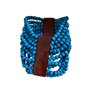 Bracciale bohémien multistrato fatto a mano in perle di legno blu e legno scuro