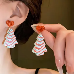 Festive red glitter heart and Christmas tree drop earrings for women holiday style