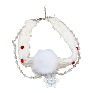 Festive Christmas necklace featuring a white fuzzy pom-pom and snowflake pearl pendant