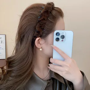 Elegant brown plush headband in retro Maillard style for autumn and winter outfits