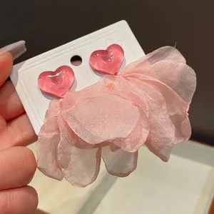 Elegant pink heart stud earrings with cascading fabric flower petal tassels for women.