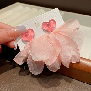 Exquisite pink fabric petal tassel earrings with glossy heart-shaped resin studs