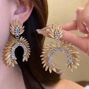 Elegant S925 silver needle drop earrings with amber crystals and sparkling rhinestones