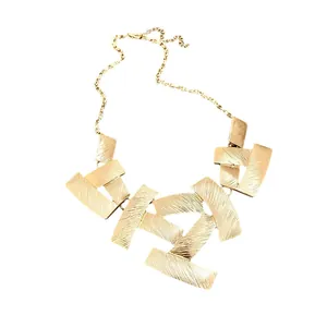 Vintage gold geometric textured necklace featuring metallic rectangular plates on a chain