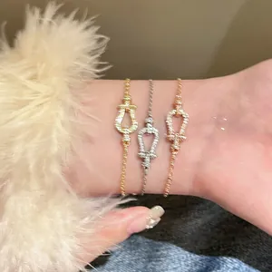 Elegant luxury horseshoe buckle bracelets in gold, silver, and rose gold finishes.