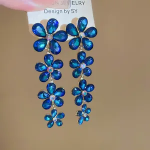 Elegant blue crystal flower drop earrings with silver needles for a very stylish look