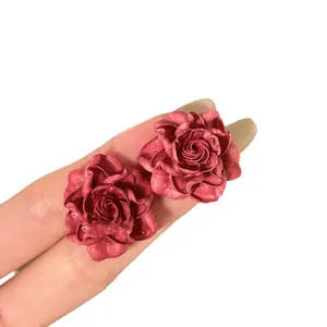 Elegant red resin rose stud earrings with minimalist floral design