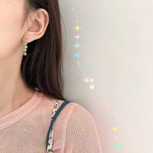 Exquisite colorful candy-colored daisy flower long chain drop earrings worn by model