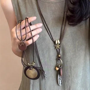 Collier Longue Plume Style Zen Chinois Vintage Ethnique Bohème Alliage Bois Perlé Chaîne de Pull Superposée pour Femmes