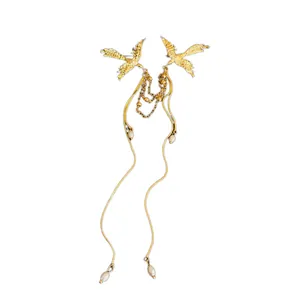 Elegant gold phoenix brooch with pearl tassels for creative suit styling accessory