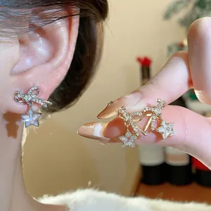 Pendientes de botón con lazo y estrella de circón brillante con agujas de plata moda
