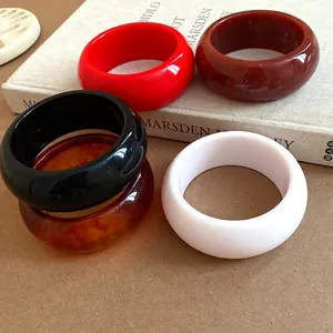 Fashionable set of chunky acrylic resin bangles in retro marbled and solid colors for women